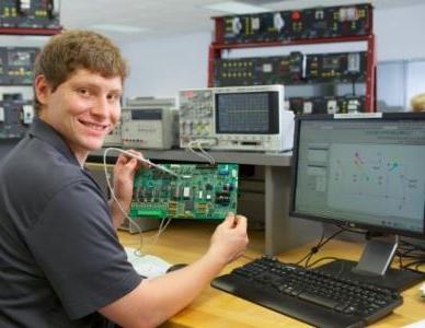 student working in an electronics lab