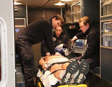 students in a paramedic and emergency medical services lab